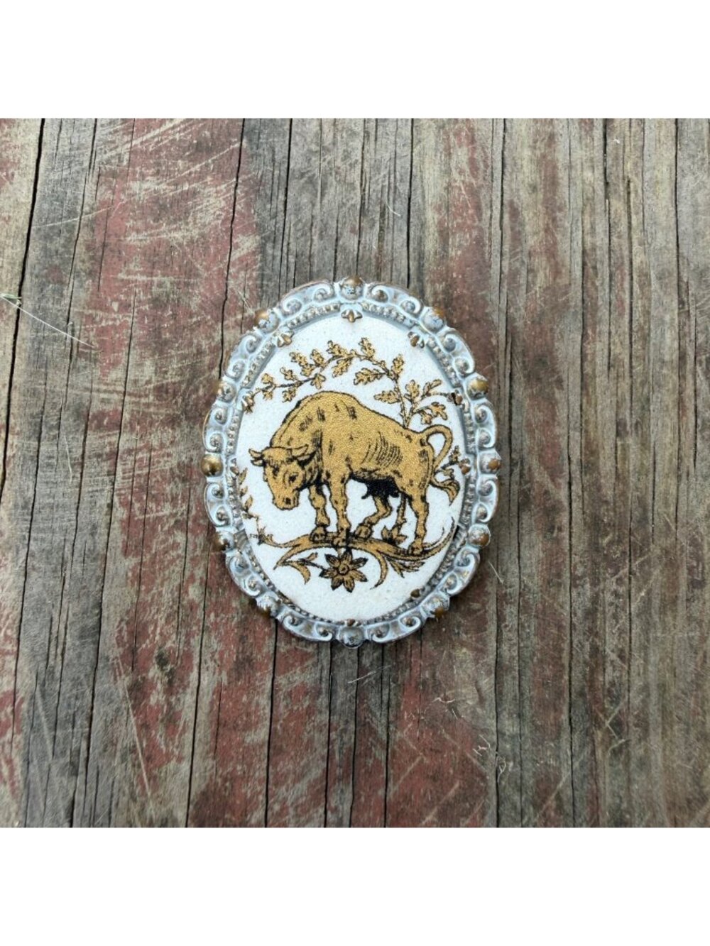 Vintage Western Germany Gold-Tone Bull Brooch With Ornate White Enamel Frame